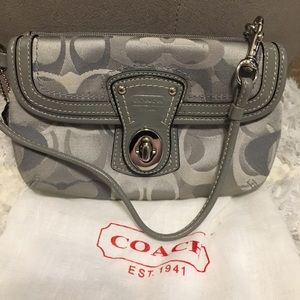 Beautiful Coach silver/grey wristlet in bag